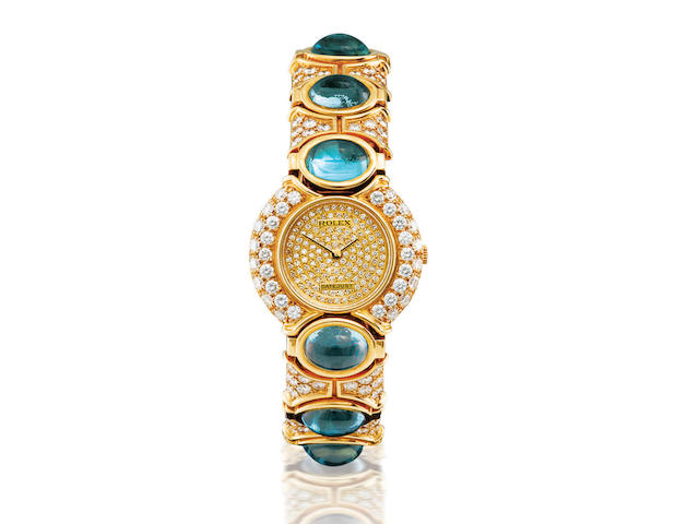 Rolex. A fine and rare 18ct gold, blue topaz and diamond manual wind lady&#8217;s wristwatchDatejust, Ref: 2706/8, Case no. E463171