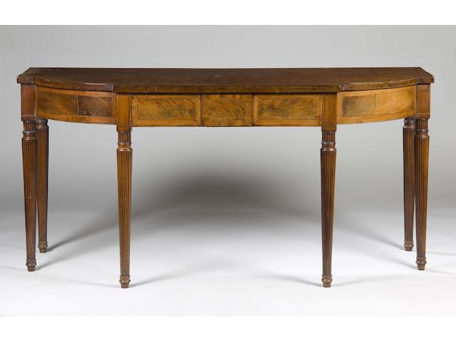 A Regency mahogany crossbanded breakfront serving table