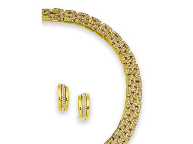 A gold and diamond necklace, bracelet and a pair of earrings, by Cartier