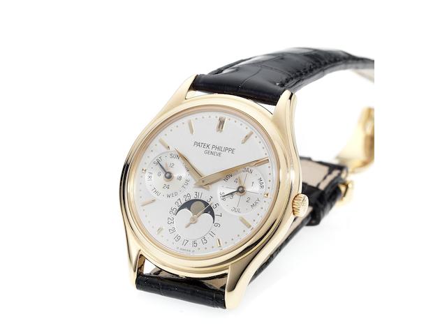 Patek Philippe. A fine and rare 18ct rose gold perpetual calendar wristwatch with 18ct rose gold deployant clasp and Extract from ArchivesRef:3940, Case No.2981617, Movement No.776493, Made in 1997, Sold January 5th 1998