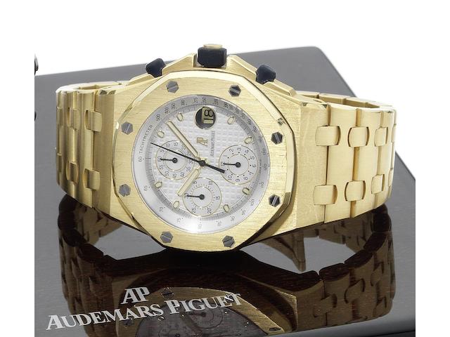 Audemars Piguet. A fine and large 18ct gold automatic chronograph calendar wristwatch  with concealed double deployant clasp and fitted box & papersRoyal Oak Offshore, No.0496, Case No.F45566, Recent