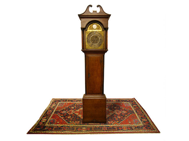 A George III oak-cased eight-day brass dial longcase clock with centre calendar sweep, circa 1780 J Atkinson, Gateshead