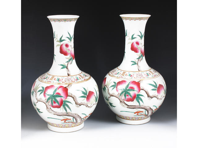 A pair of Chinese famille rose bottle vases Circa 1900.