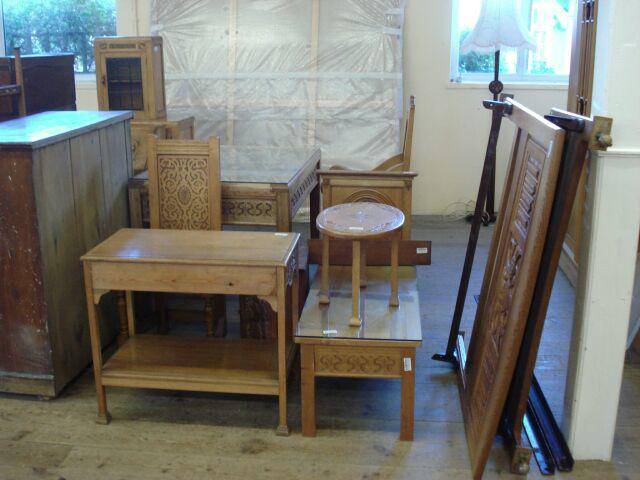 Furniture by Hubert Clements in carved oak