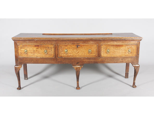 A mid/late 18th century oak dresser base