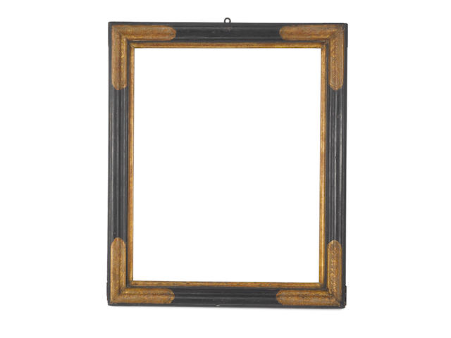An Italian 17th Century parcel gilt and black painted frame