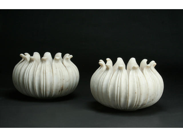 A pair of Mughal style carved white marble jardini&#232;res