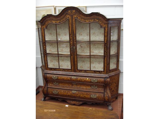 An 18th Century style Dutch floral marquetry bombe display cabinet