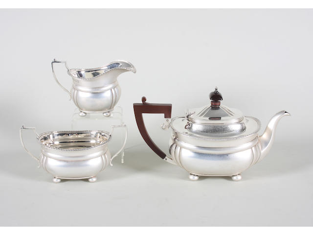 A silver three piece bachelor's tea set By Mappin and Webb, Birmingham, 1935,  (3)