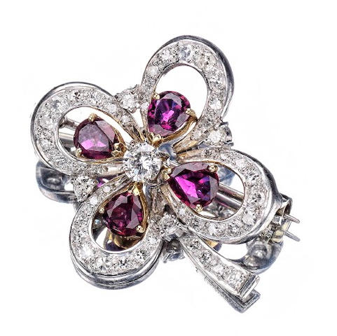 A ruby and diamond four leaf clover brooch, by Cartier