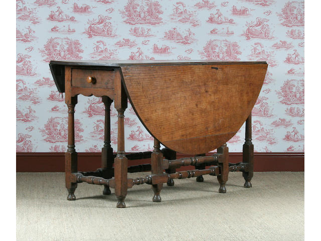 An oak gateleg table, early 18th Century