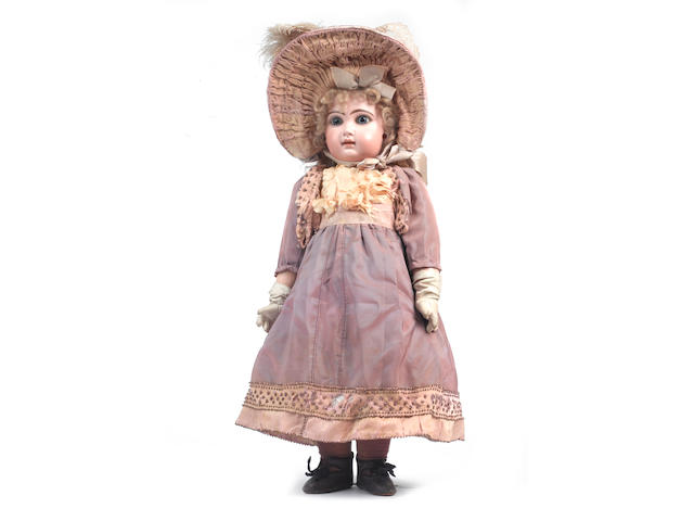A fine size 9 closed mouth Tete Jumeau bisque head Bebe, French circa 1890