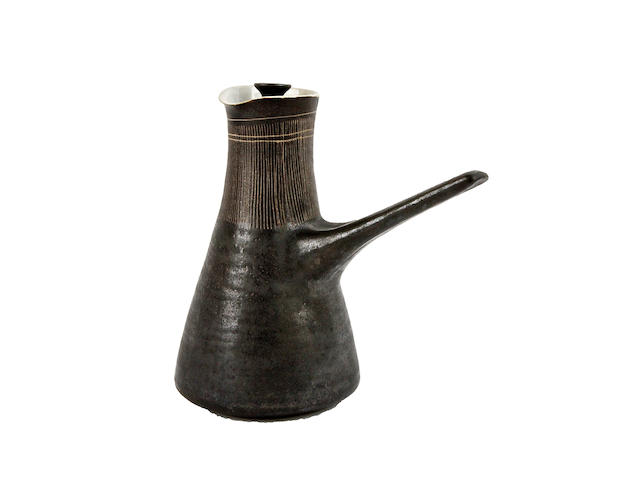 A coffee pot and cover with side handle by Lucie Rie Circa 1960