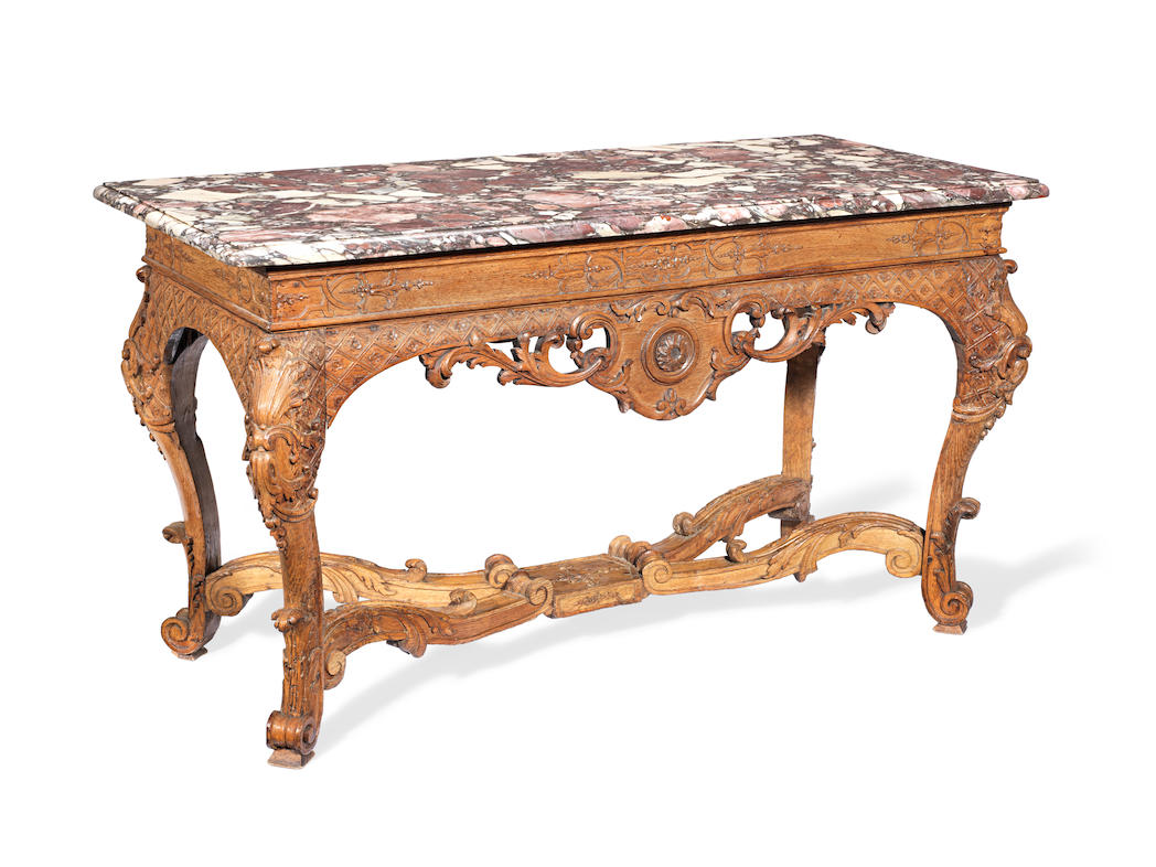 A Regence carved oak table a gibier