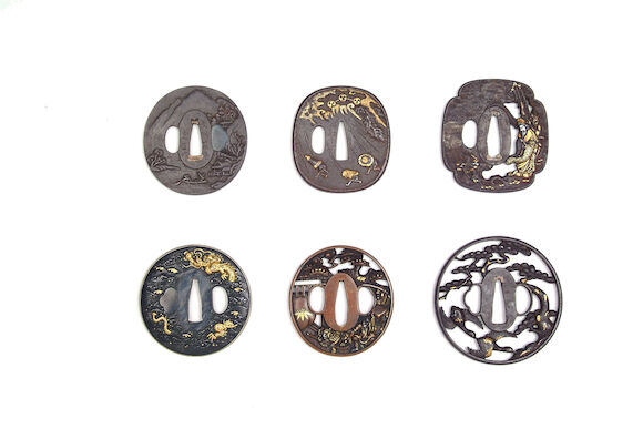 Bonhams : A Rounded Iron Tsuba Signed Bushu Ju Tomonobu Saku, Edo Period 7.2 cm.
