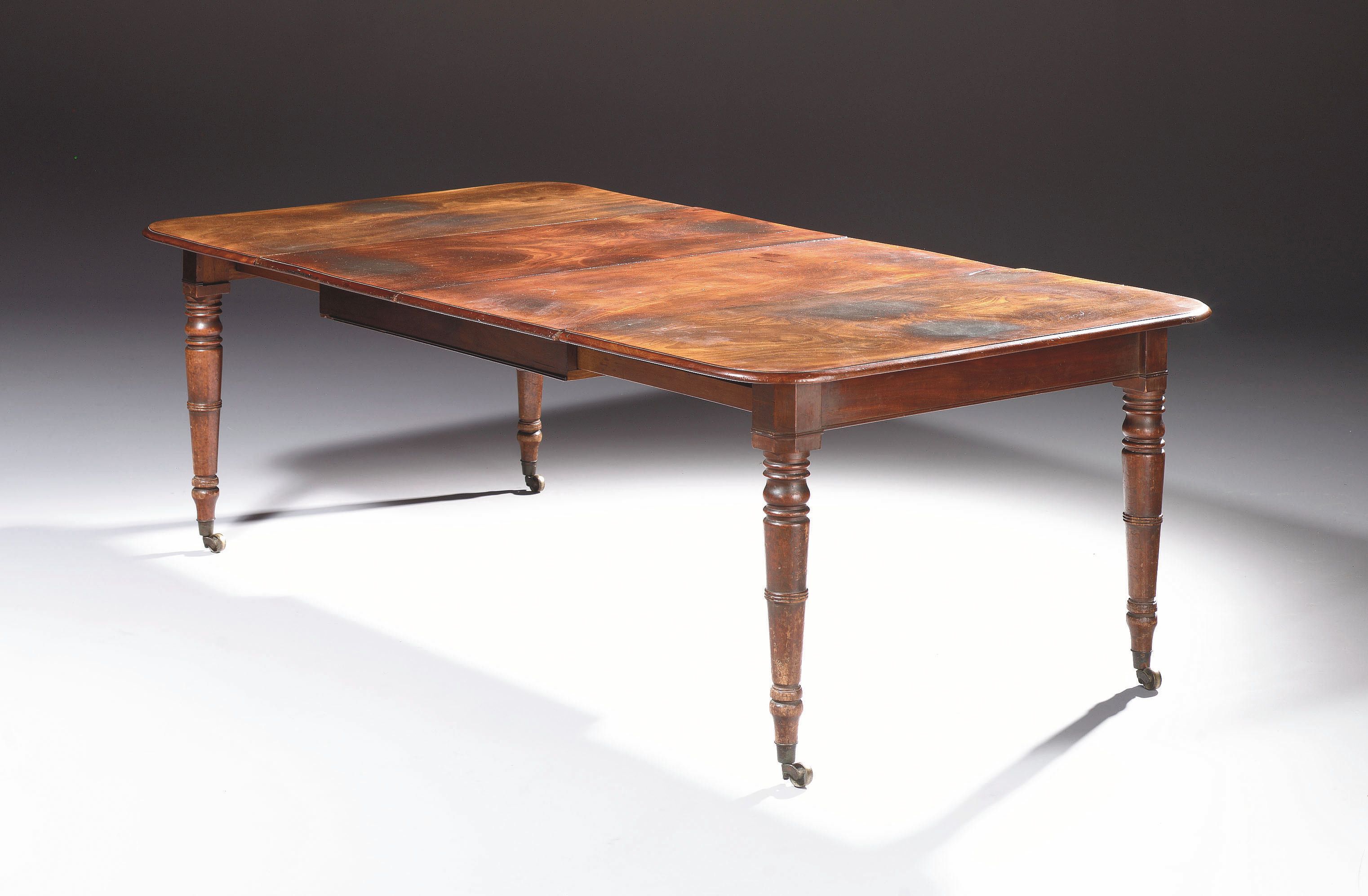 A Regency mahogany extending Dining Table
