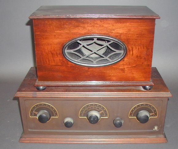Bonhams : A Stewart Warner Model 300 five valve walnut cased receiver,
