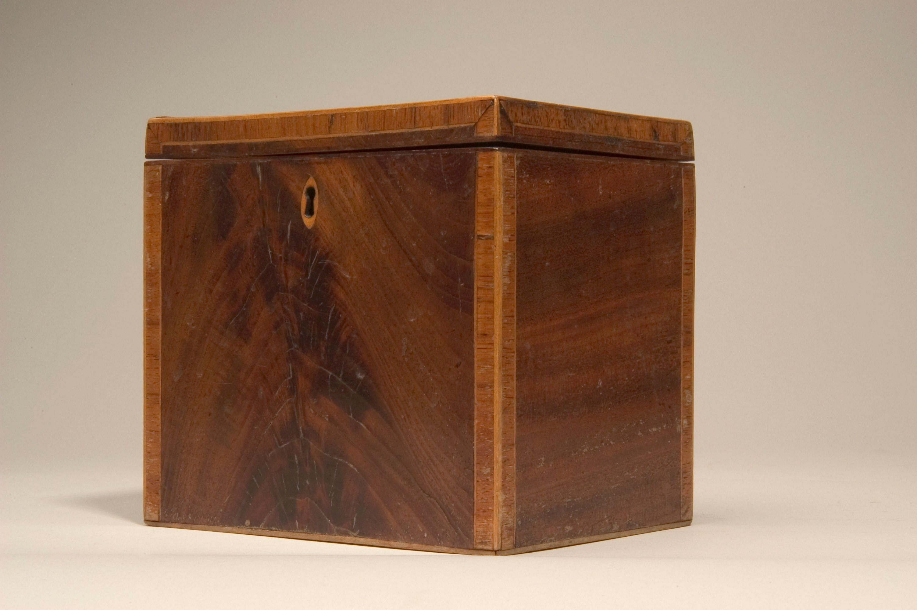 A George III mahogany rectangular tea caddy,