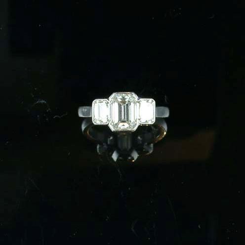 A diamond three-stone ring