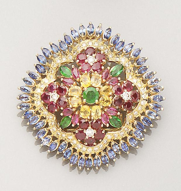 A gem-set cluster brooch