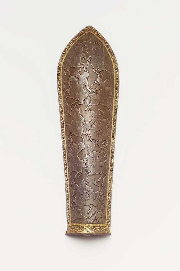 Bonhams : A Qajar gold damascened steel Arm Guard Persia, 19th Century