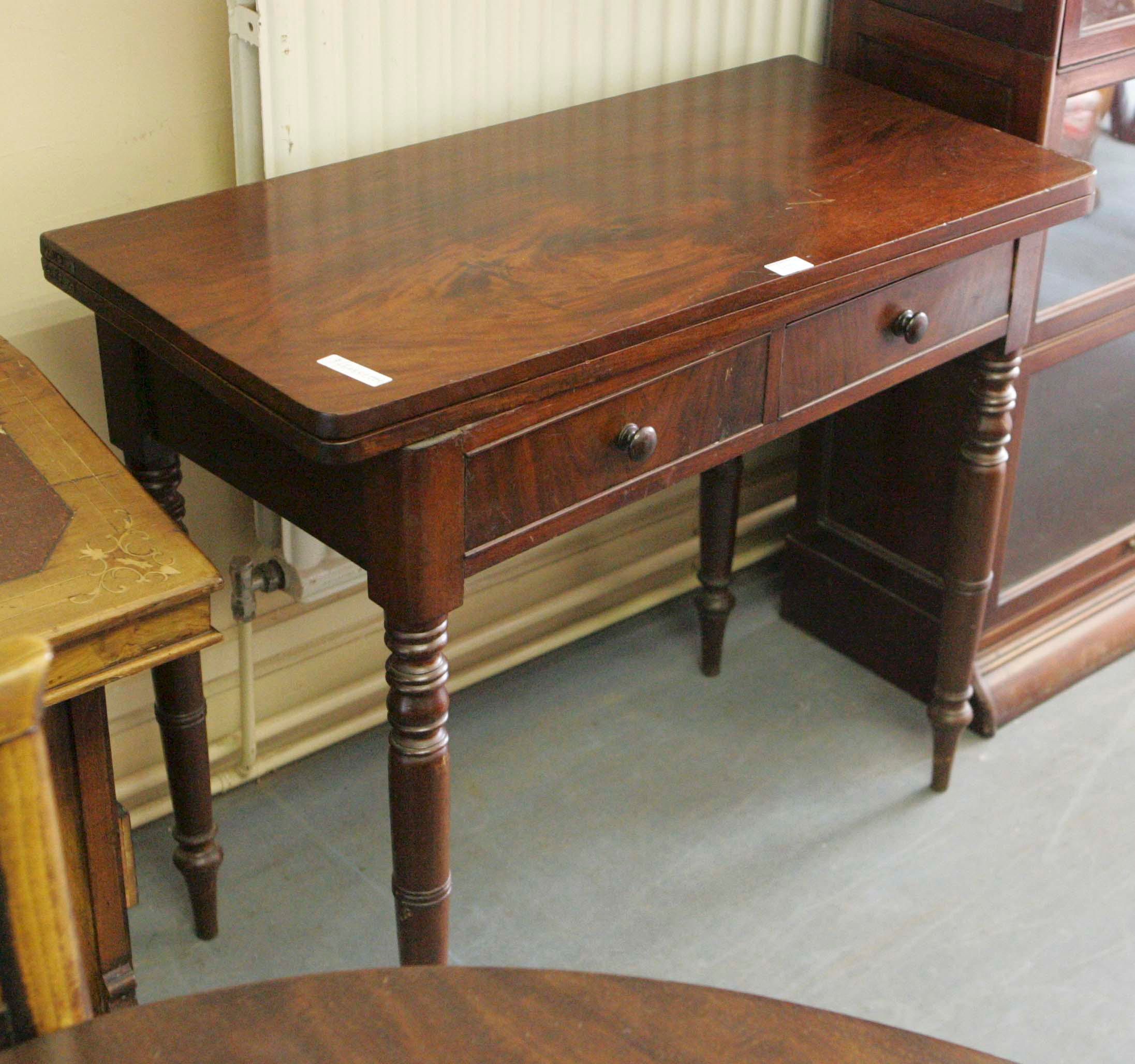 A Regency mahogany foldover Tea Table,