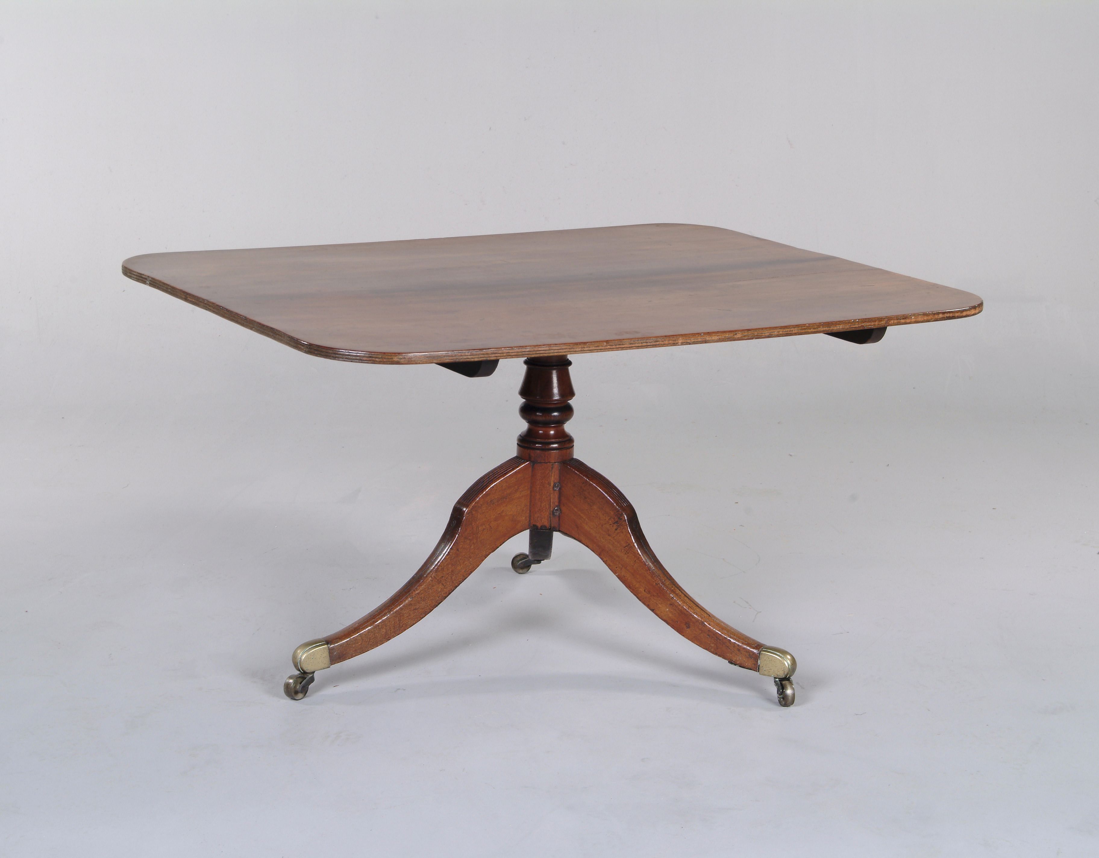 A Regency mahogany breakfast table