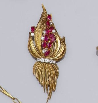 A ruby and diamond foliate spray brooch