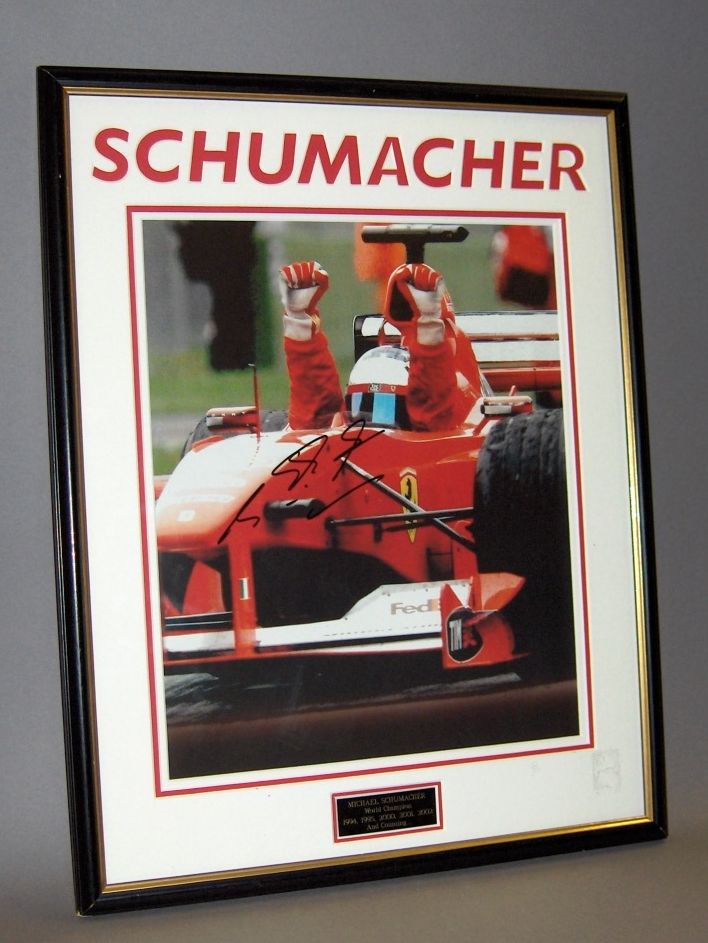 Bonhams Cars : A signed Michael Schumacher colour photo-print,