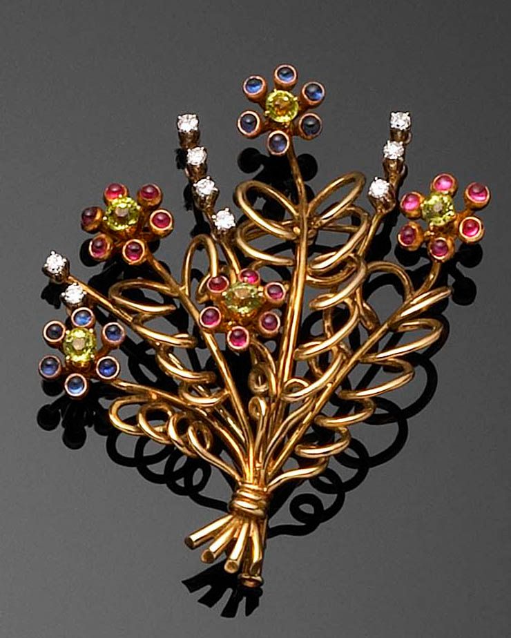 A multi-gem spray brooch