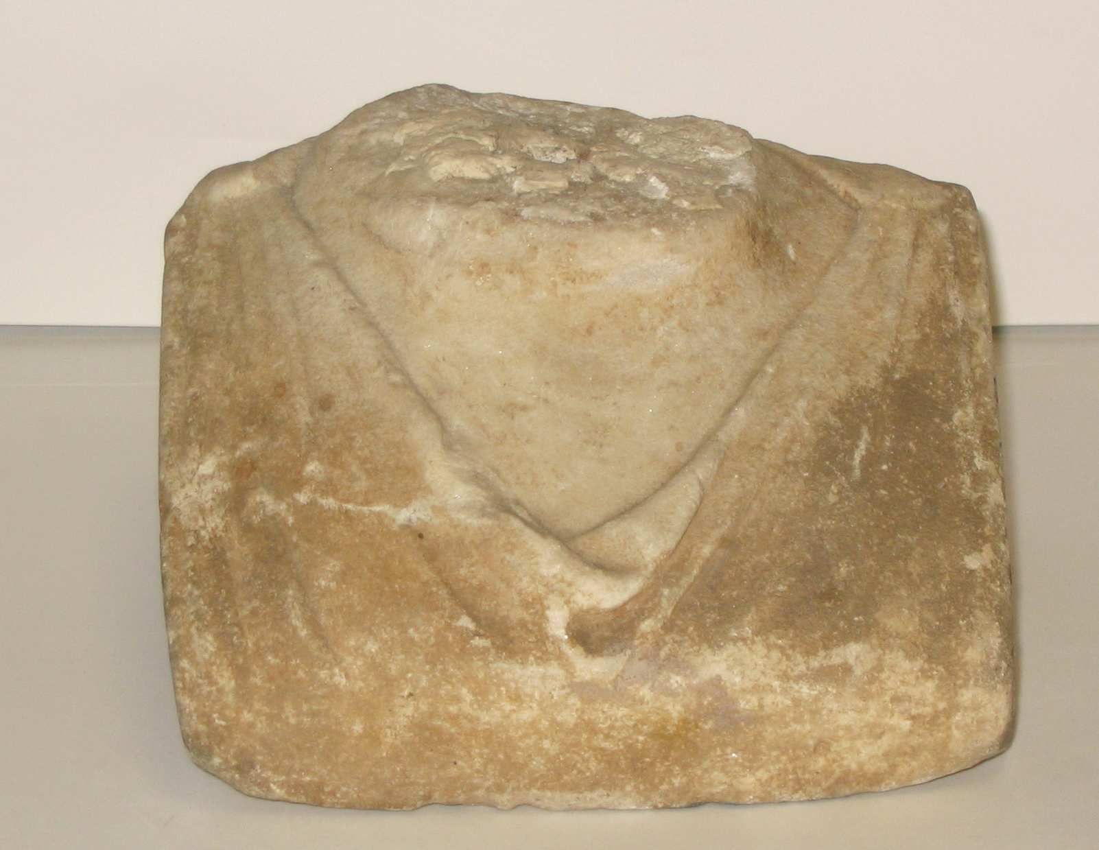 A Roman marble bust base