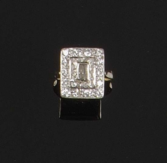 A diamond rectangular panel ring