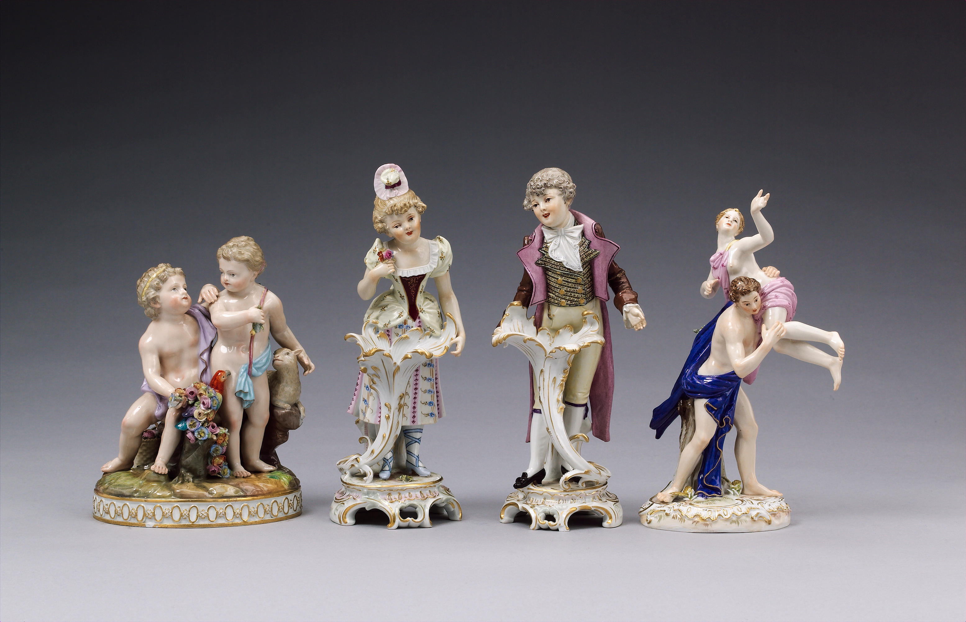 An amusing Meissen group of two putti