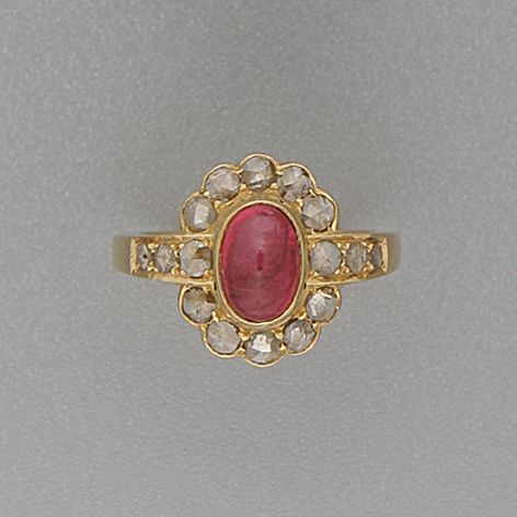 A ruby and diamond cluster ring
