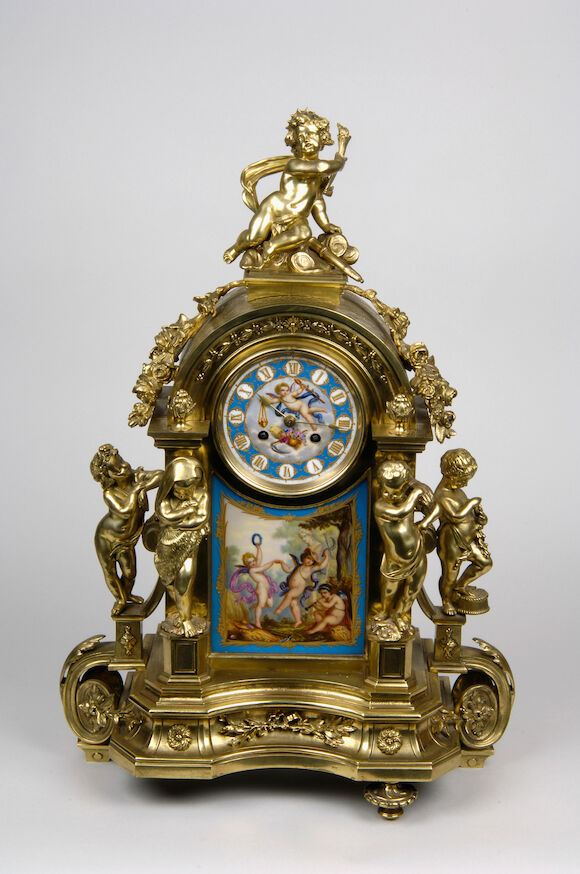 Bonhams : A French gilt metal and porcelain mounted figural mantel clock
