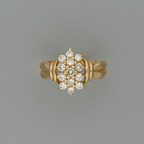 A diamond thirteen-stone cluster ring