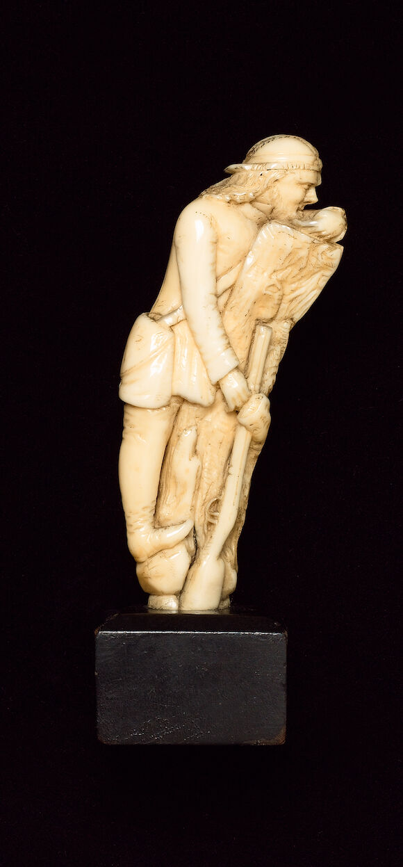 Bonhams : A 19th century carved ivory figure of a hunter