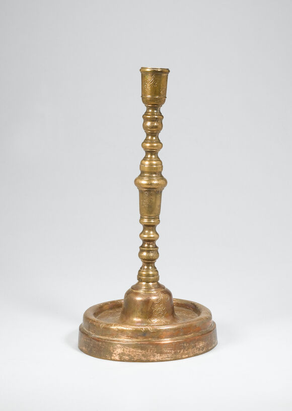 Bonhams : An Ottoman gilt copper (tombak) Candlestick Turkey, 18th Century