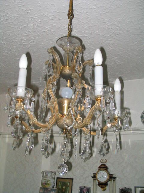 Bonhams : A 20th century gilt metal and cut glass five light chandelier