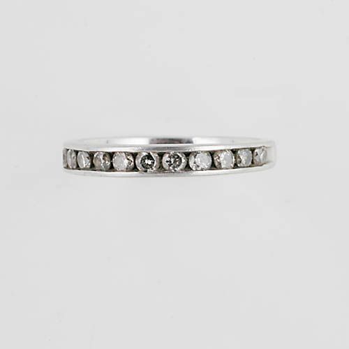 A diamond half eternity ring