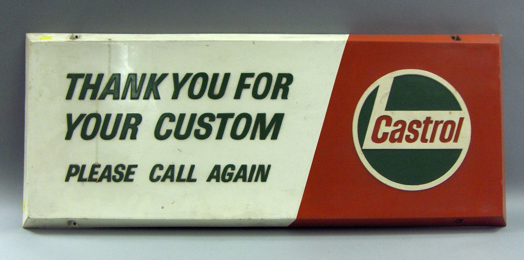 Bonhams Cars : A Castrol sign,