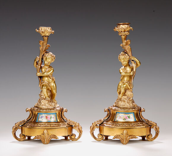 Bonhams : A pair of late 19th century gilt metal candlesticks
