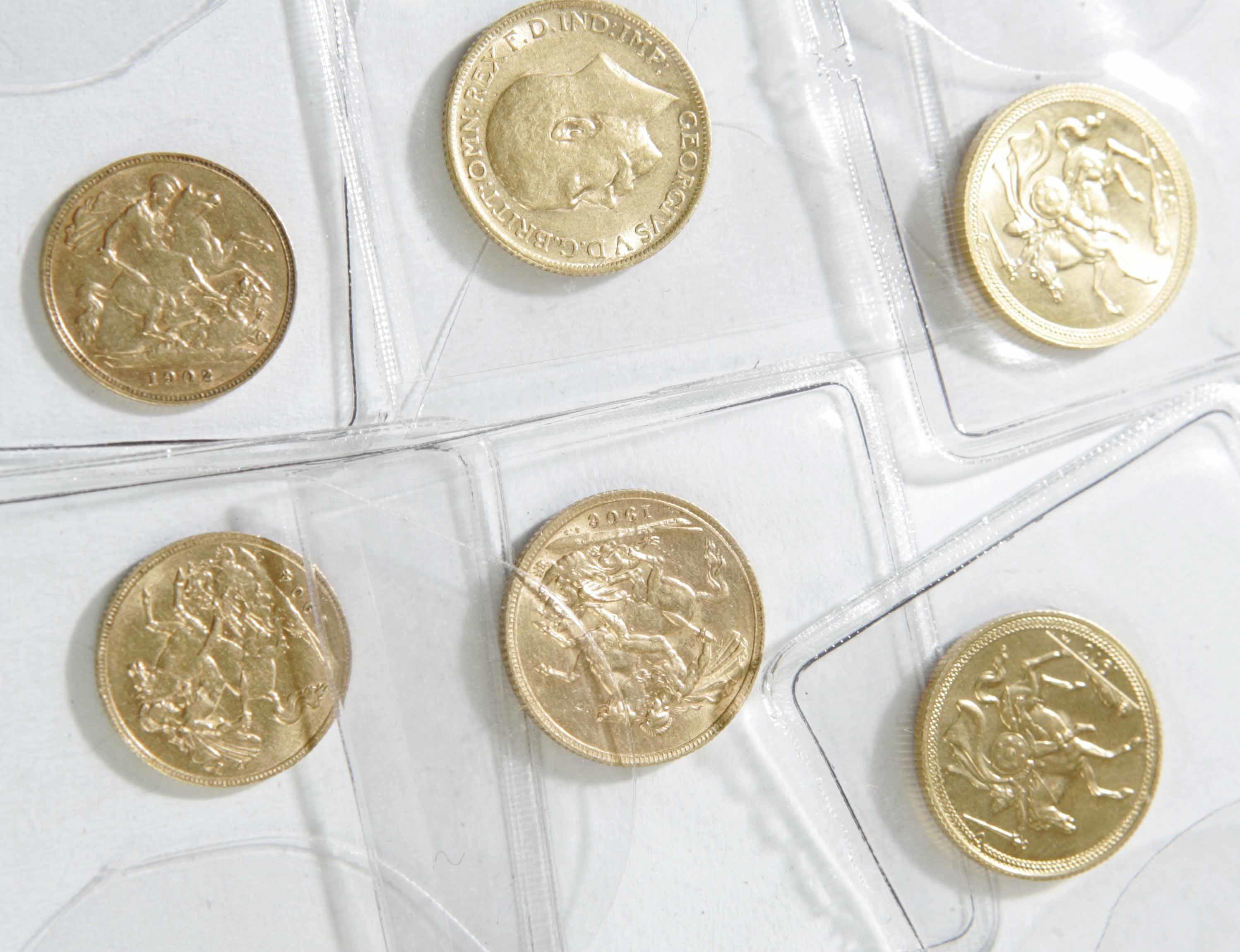 A collection of four sovereigns and two half-sovereigns