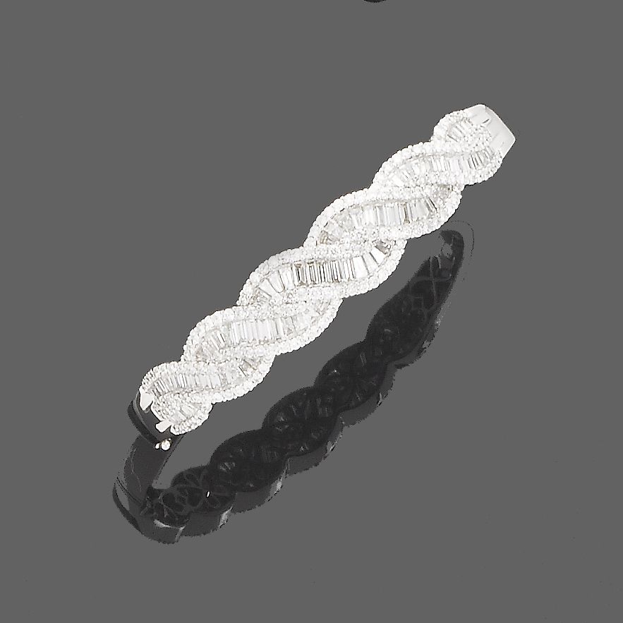 A diamond half-hoop bangle