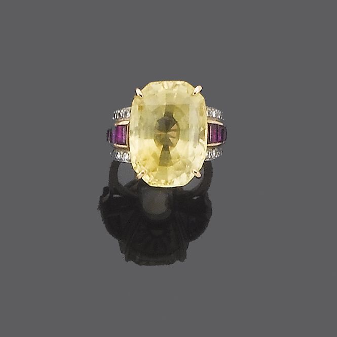 A yellow sapphire, ruby and diamond ring