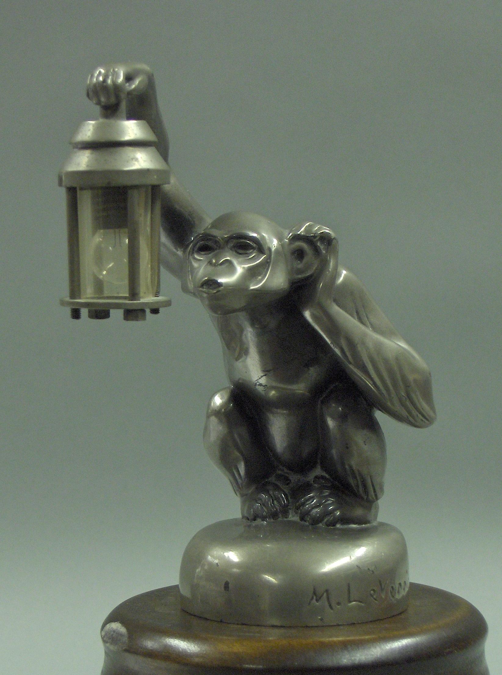 Bonhams Cars : A 'Boubou' monkey car mascot by M. Le Verrier, French, 1925,