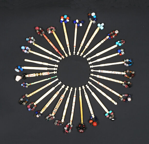 Bonhams : A hanging bone bobbin