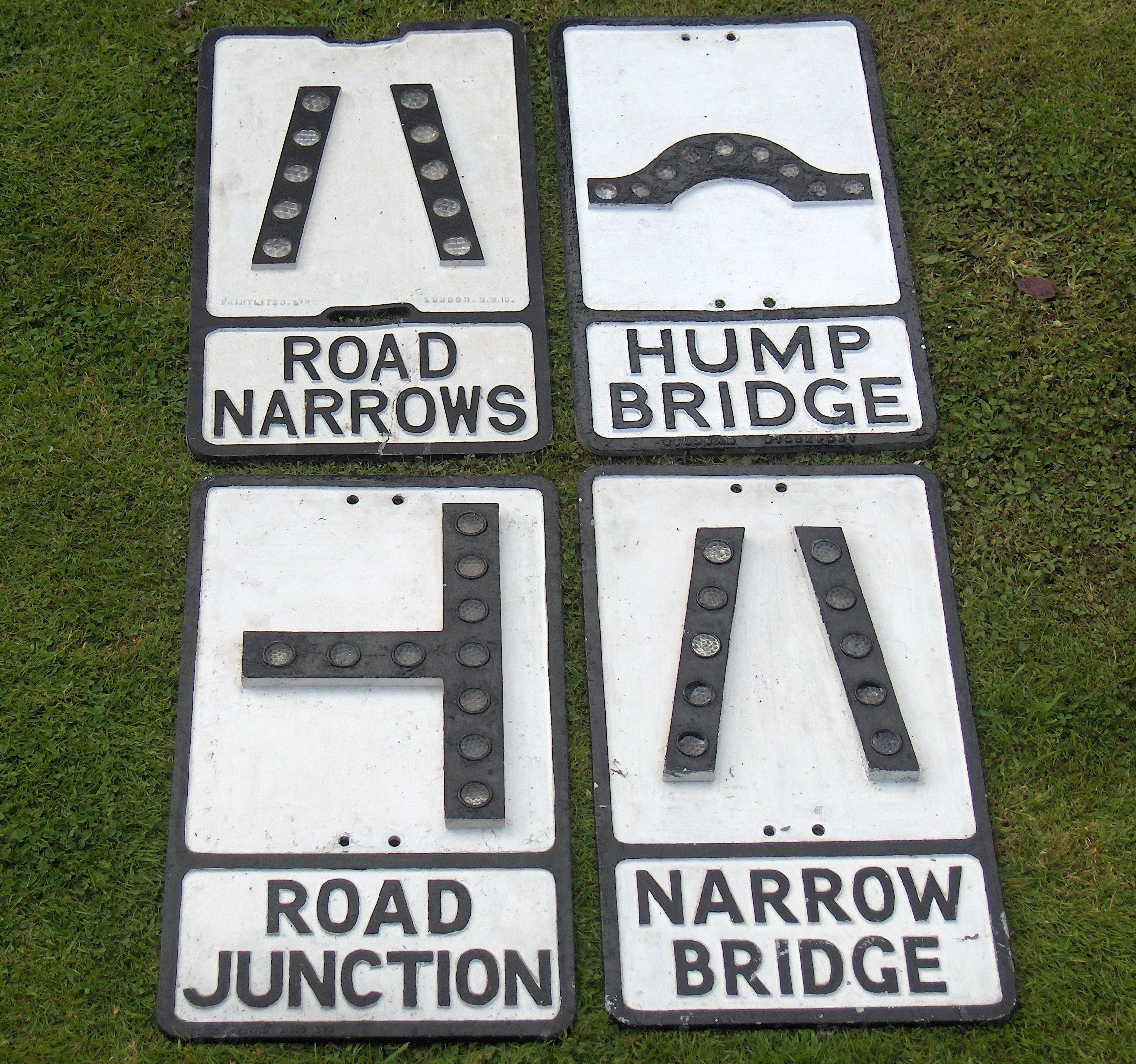 Bonhams Cars : Four reflective road signs,
