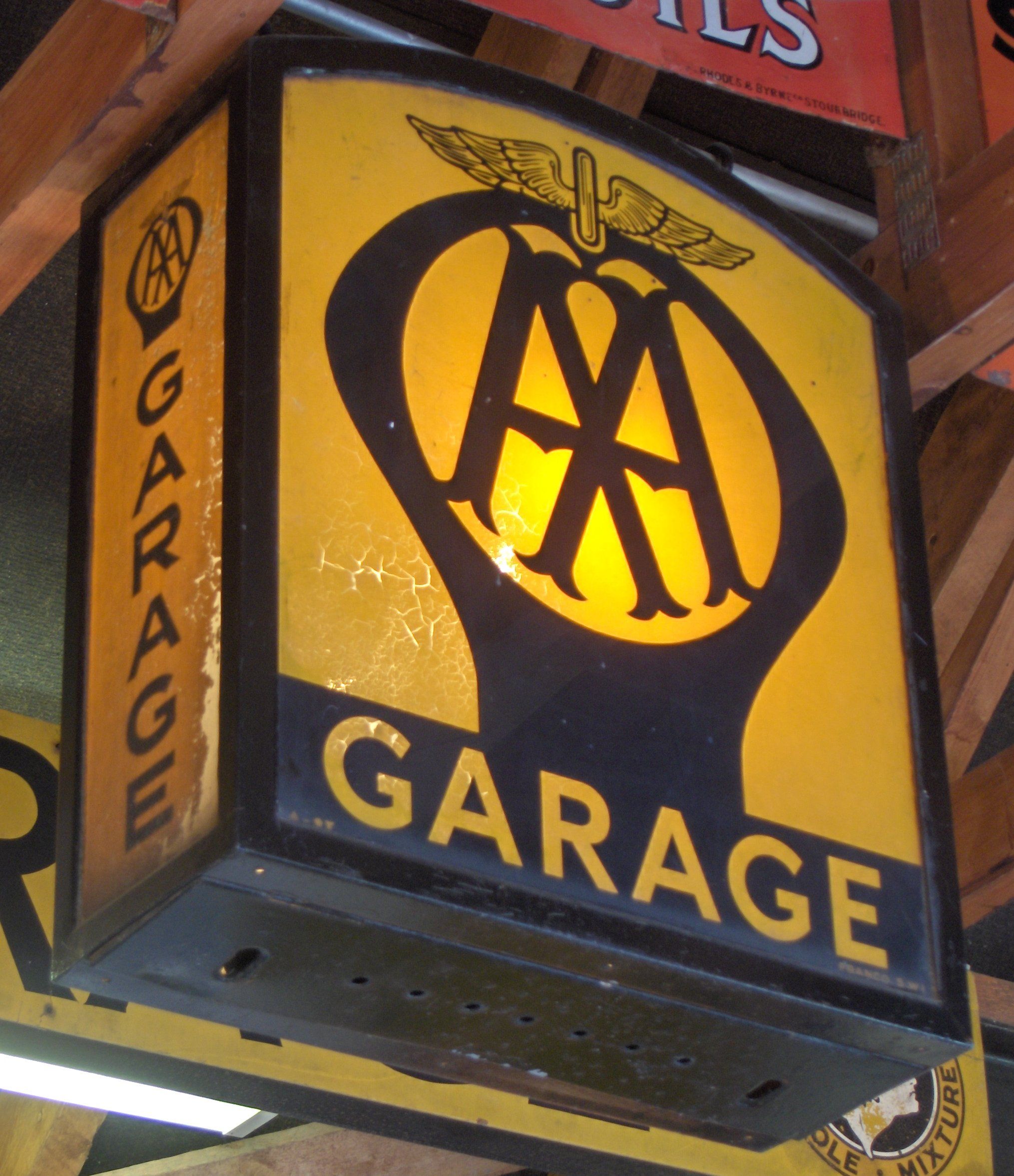 Bonhams Cars : An AA Garage illuminated sign,