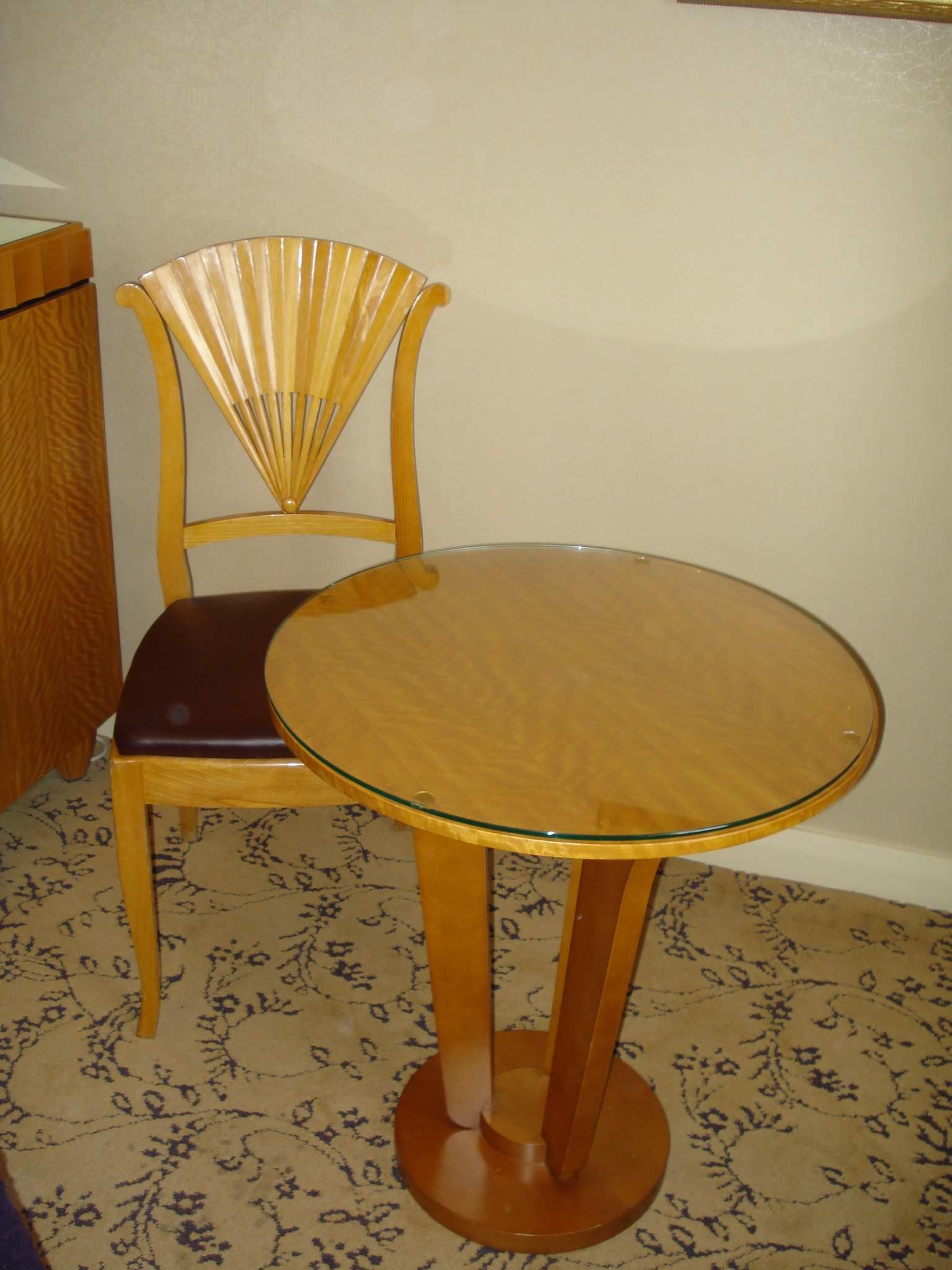 A satinbirch circular centre table